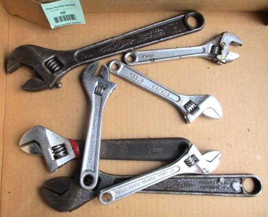 Box of adjustable wrenches