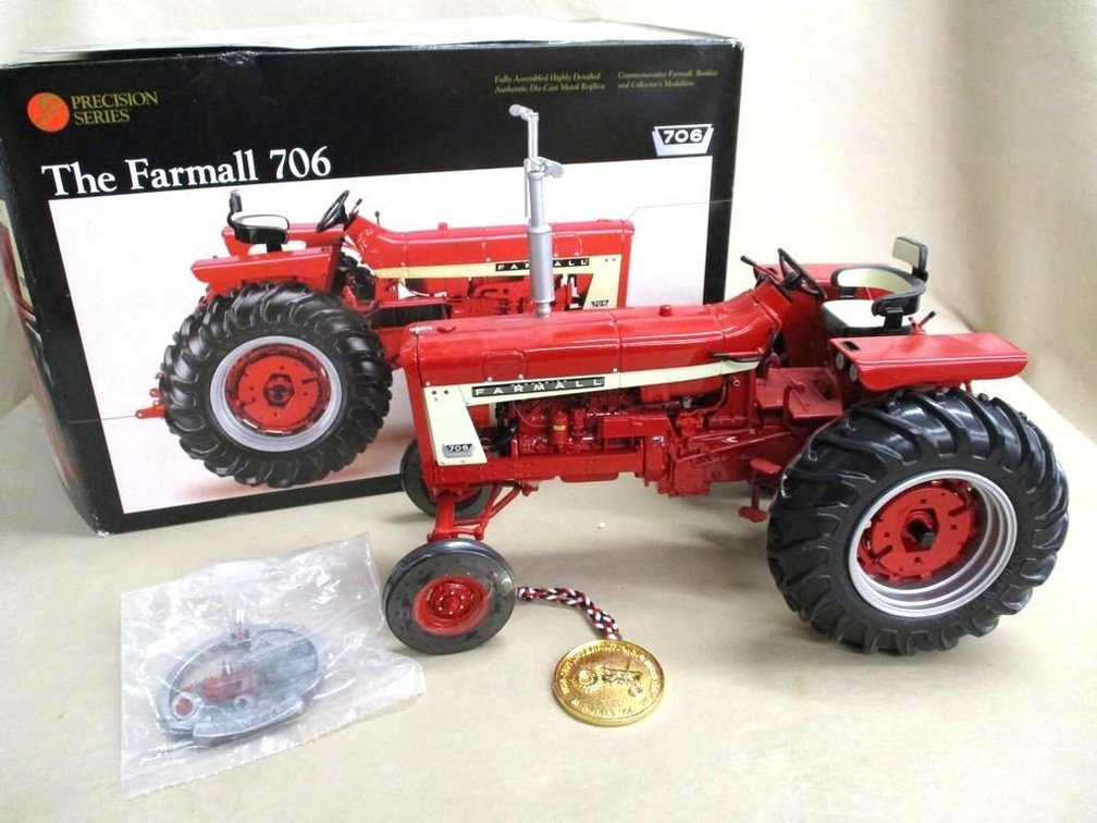 Ertl Precision Series The Farmall 706 wide front tractor in box