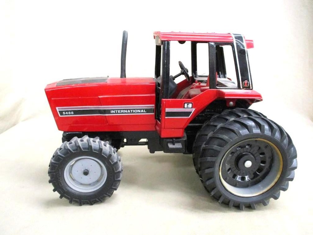 Ertl International 5488 wide front tractor with cab model and dual tires