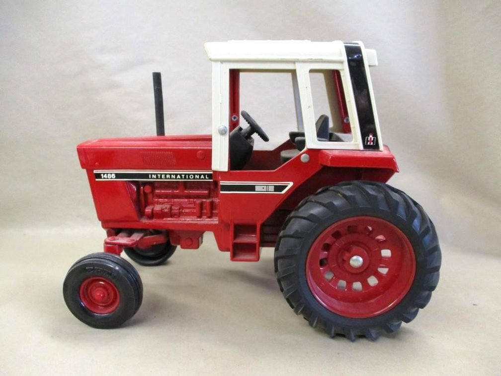 Ertl International model 1486 wide front tractor with cab model
