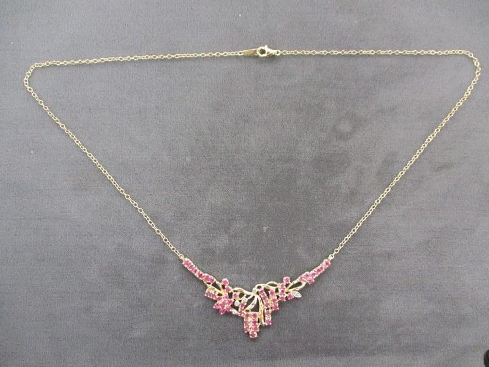 Sterling silver ruby and diamond necklace
