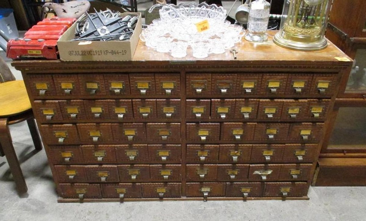 J.D. Warren Mfg. Co. antique oak 54-drawer wood cabinet