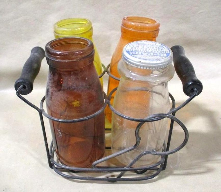Group of cream bottles in carrier