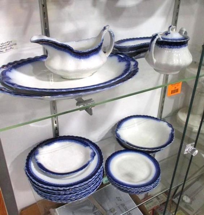 Set of flow blue dinnerware