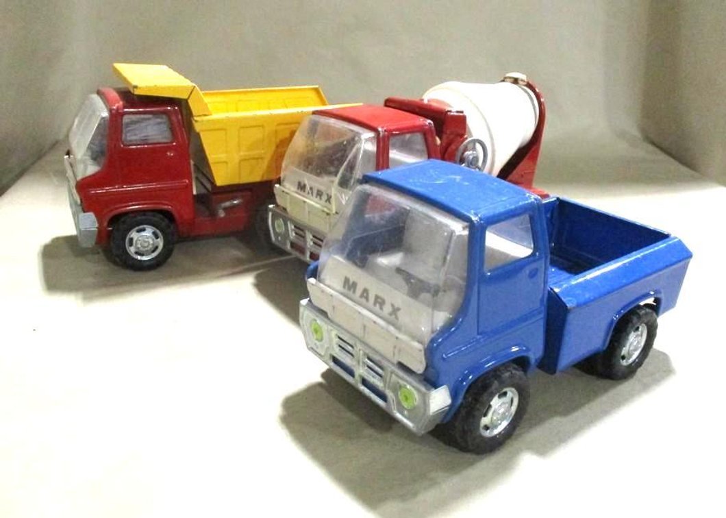 (3) Marx pressed metal construction trucks