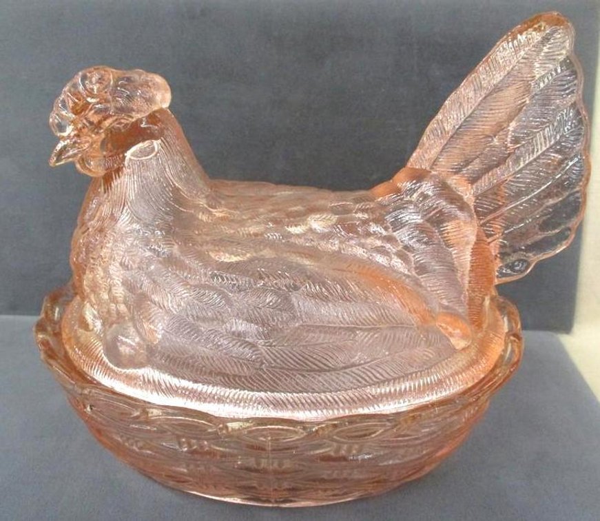 Pink glass chicken on nest