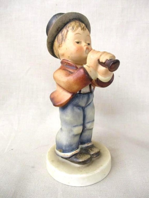 Goebel Hummel Boy playing Horn figurine, chipped