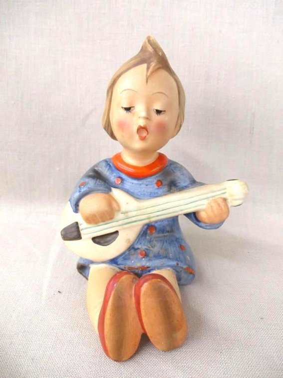 Goebel Hummel Boy Playing Guitar figurine