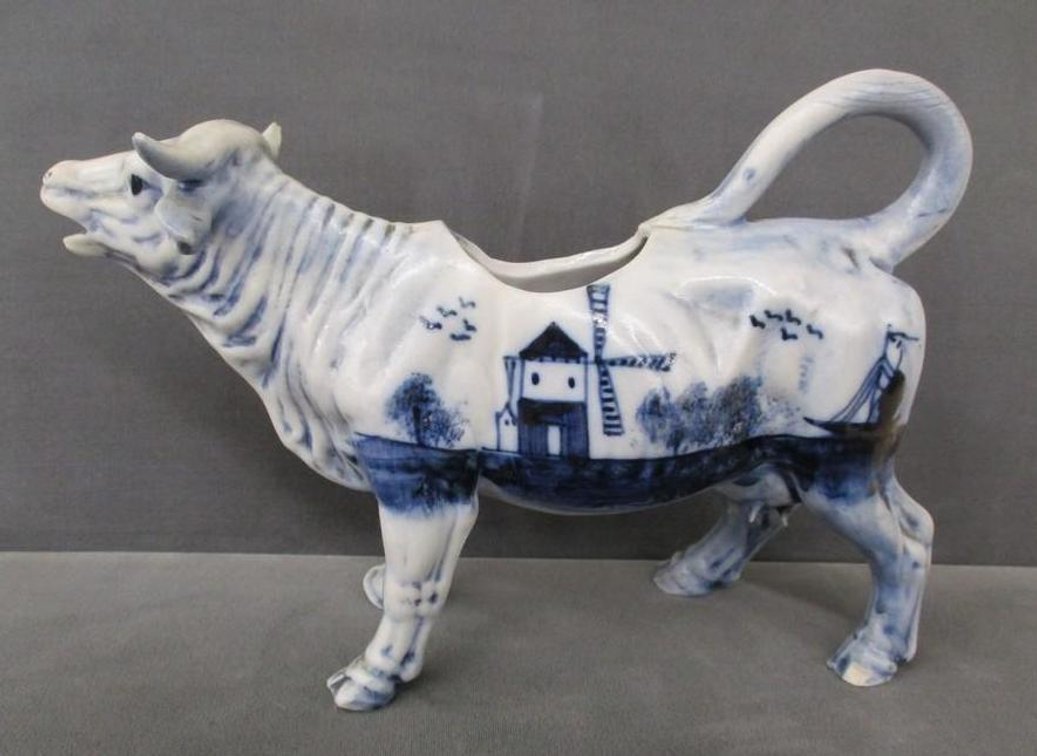 Porcelain blue bull creamer with clipper ship theme