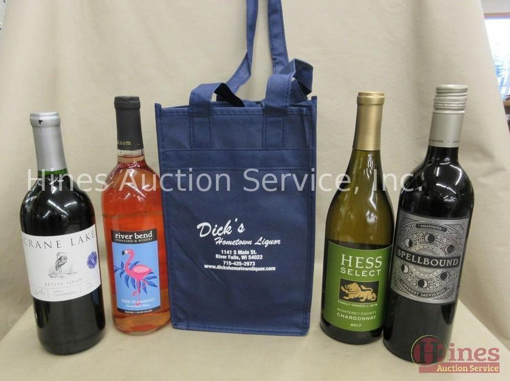 Four bottles of wine in carry bag