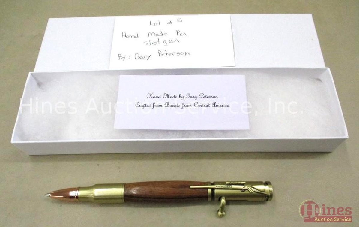 Hand made shotgun shell pen crafted from Bocole from Central America
