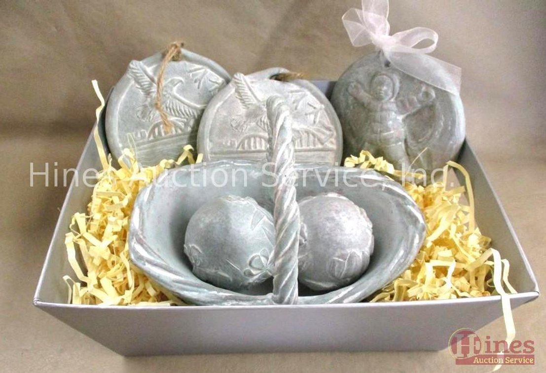 Group of concrete sculptures in decorative box