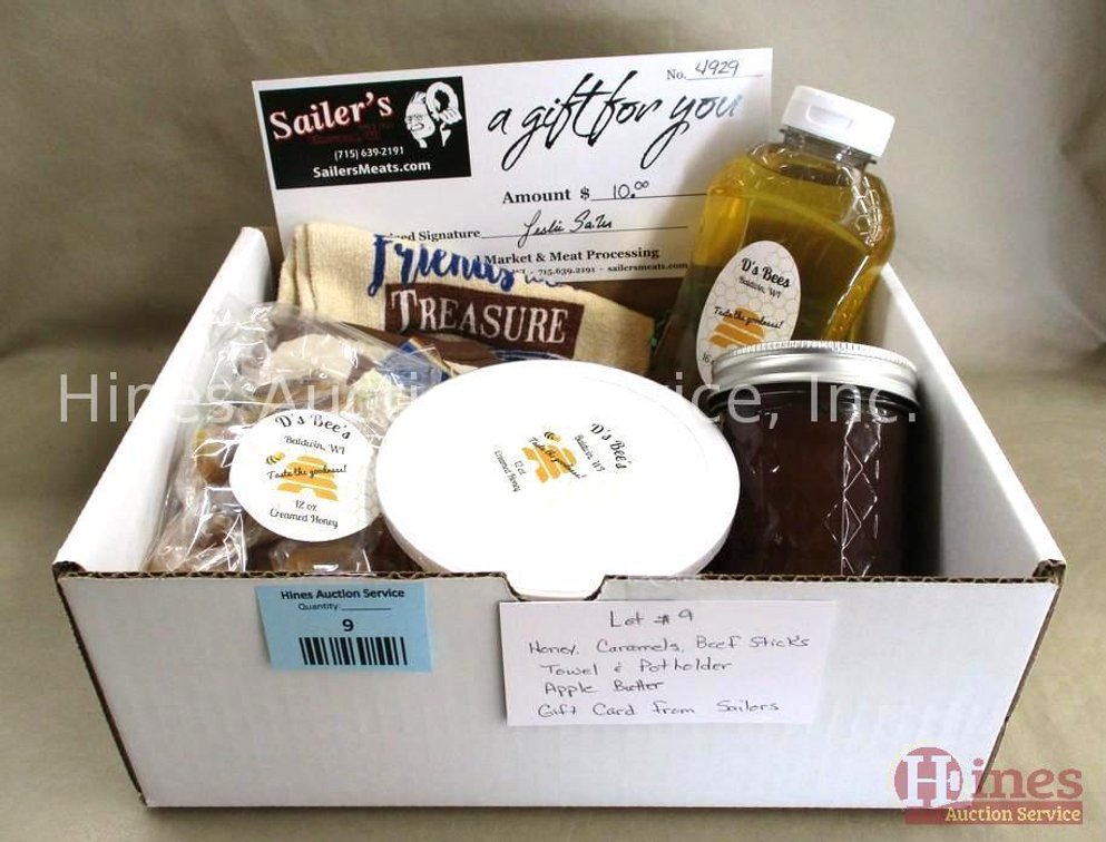 Box lot with assorted caramels, $10 gift certificate, honey, hand towel, pot holder
