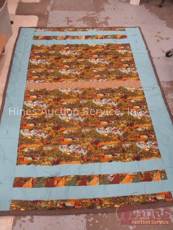 Hand made lap quilt with outdoor wildlife theme