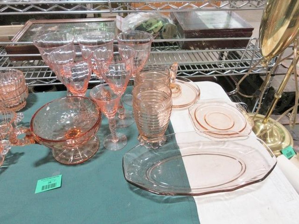 Group of unmatched pink depression glassware