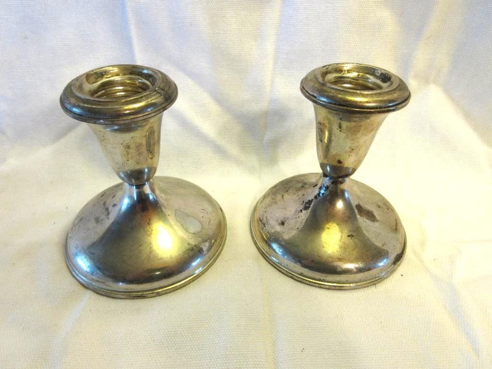 Pair of Empire sterling weighted candlesticks