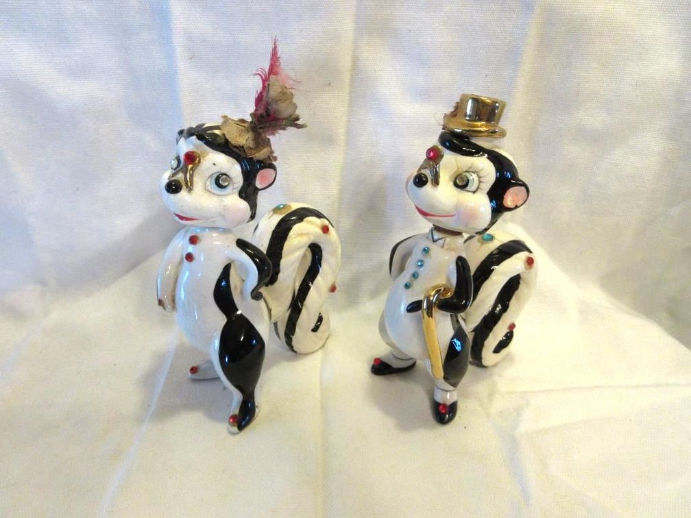 (2) Kreiss vintage skunk ceramic bottles