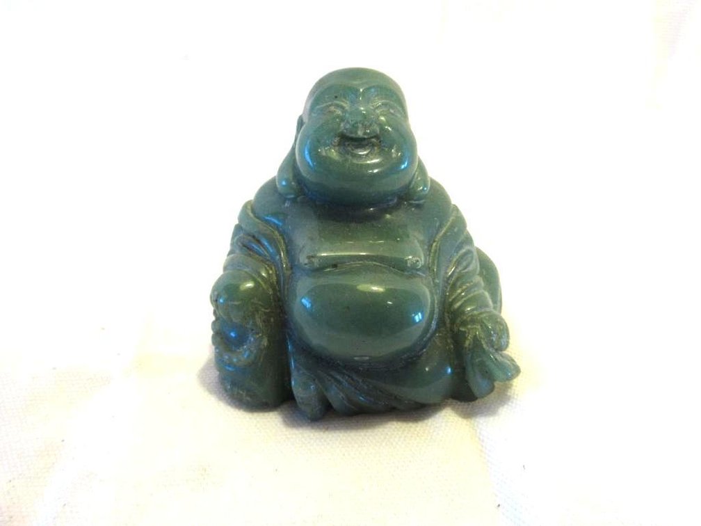 Green stone Buddha statue