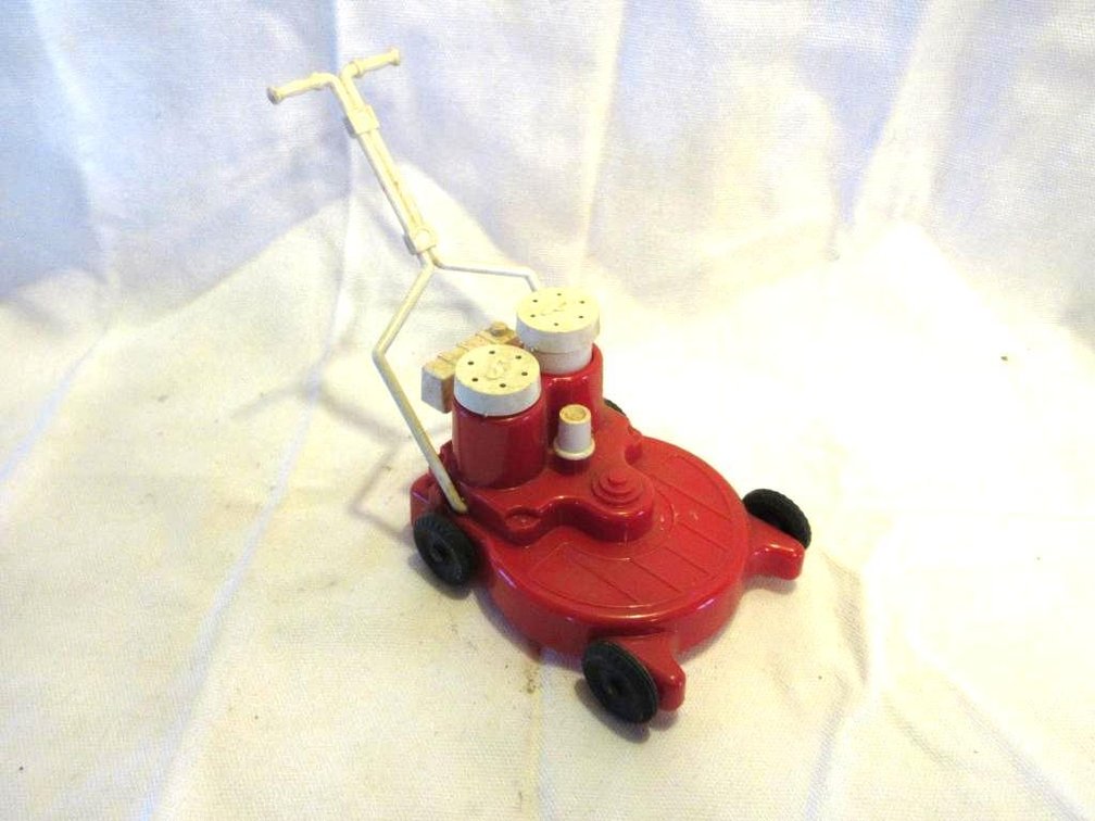 Vintage plastic lawnmower salt & pepper shaker set