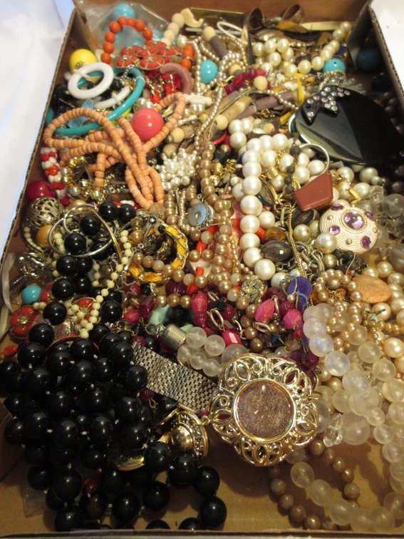 Box of vintage costume jewelry