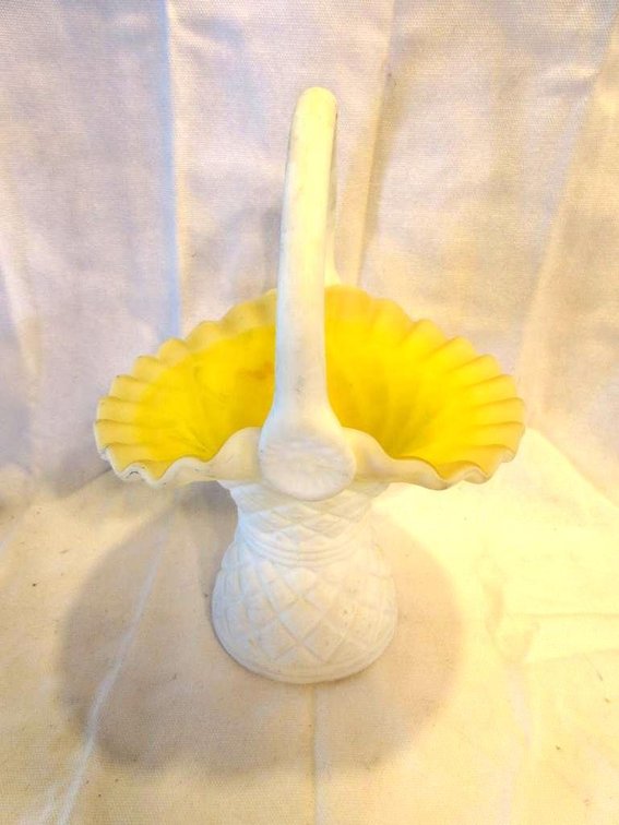 White satin glass basket with yellow interior