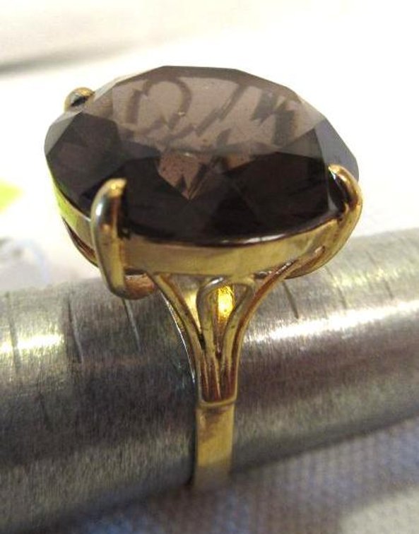 Sterling ring with amethyst colored stone