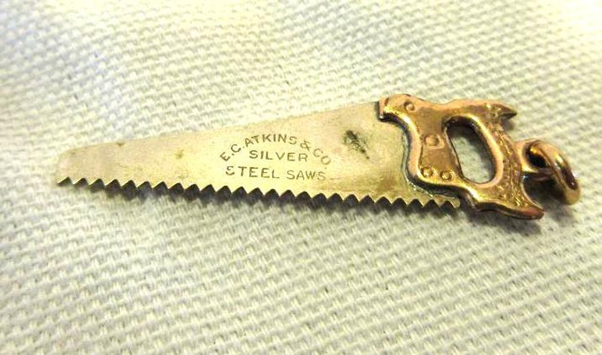 E.C. Atkins Co. Silver Steel Saws charm