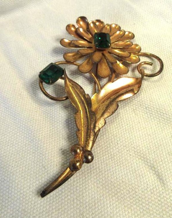 Sterling gold plated flower with green stone broach