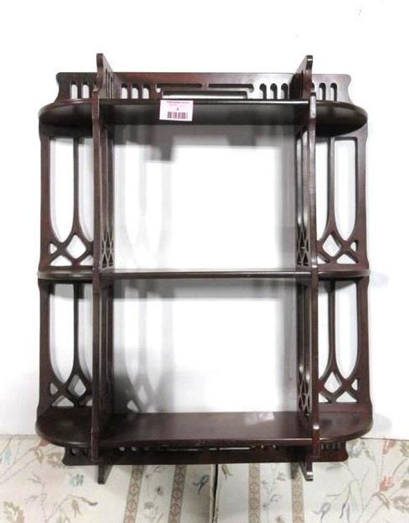 Ornate cut out wooden wall shelf