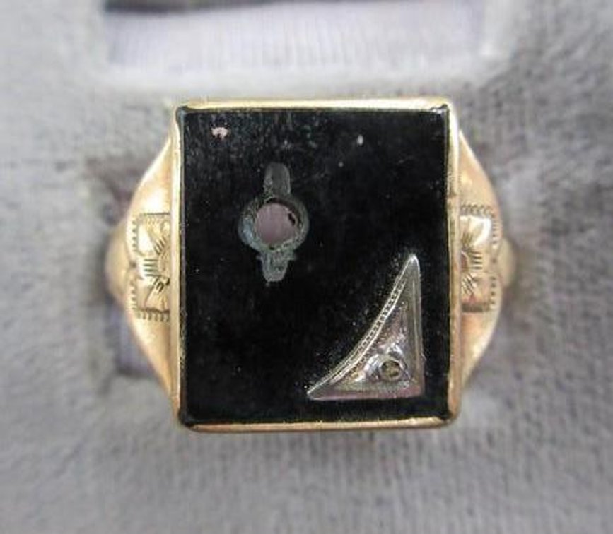 O. B. 10K ring with black onyx accent, missing center accent
