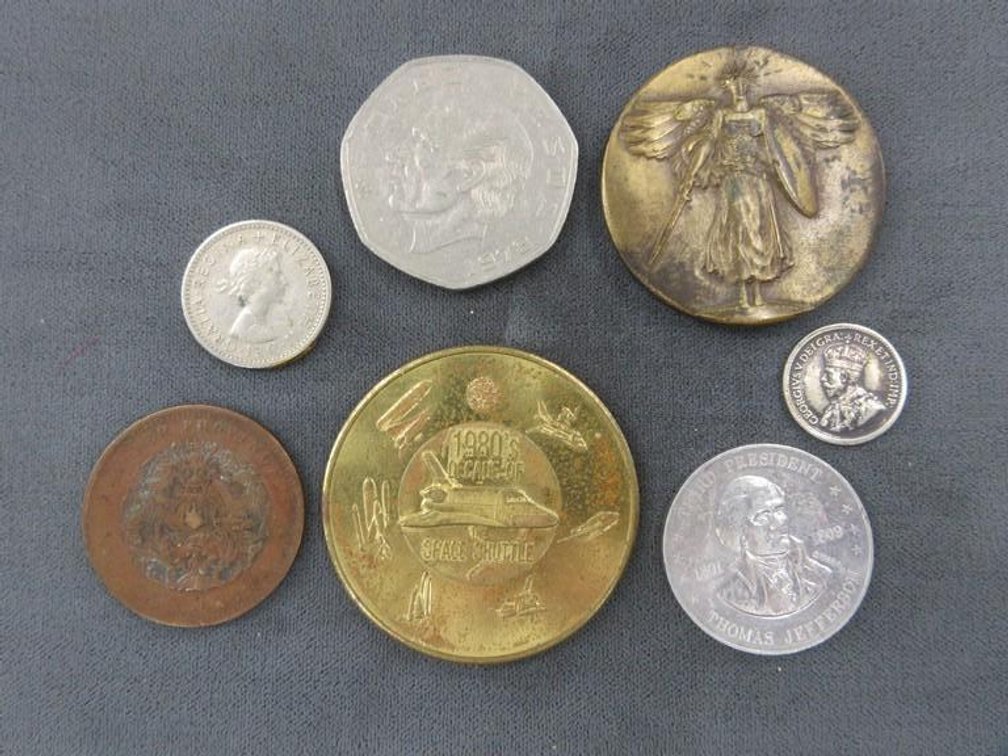 Group of foreign coins and tokens