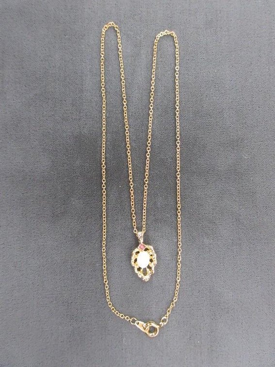 Genuine Ruby and Opal necklace