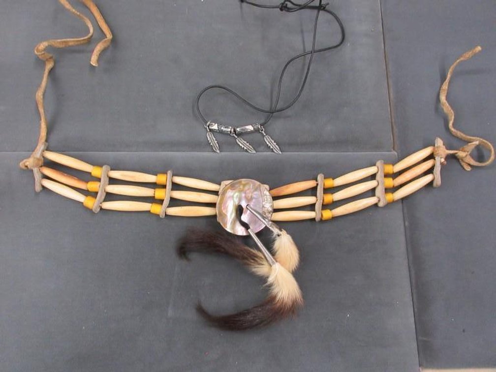 Wooden box with Native American Indian beaded necklace and feather necklace