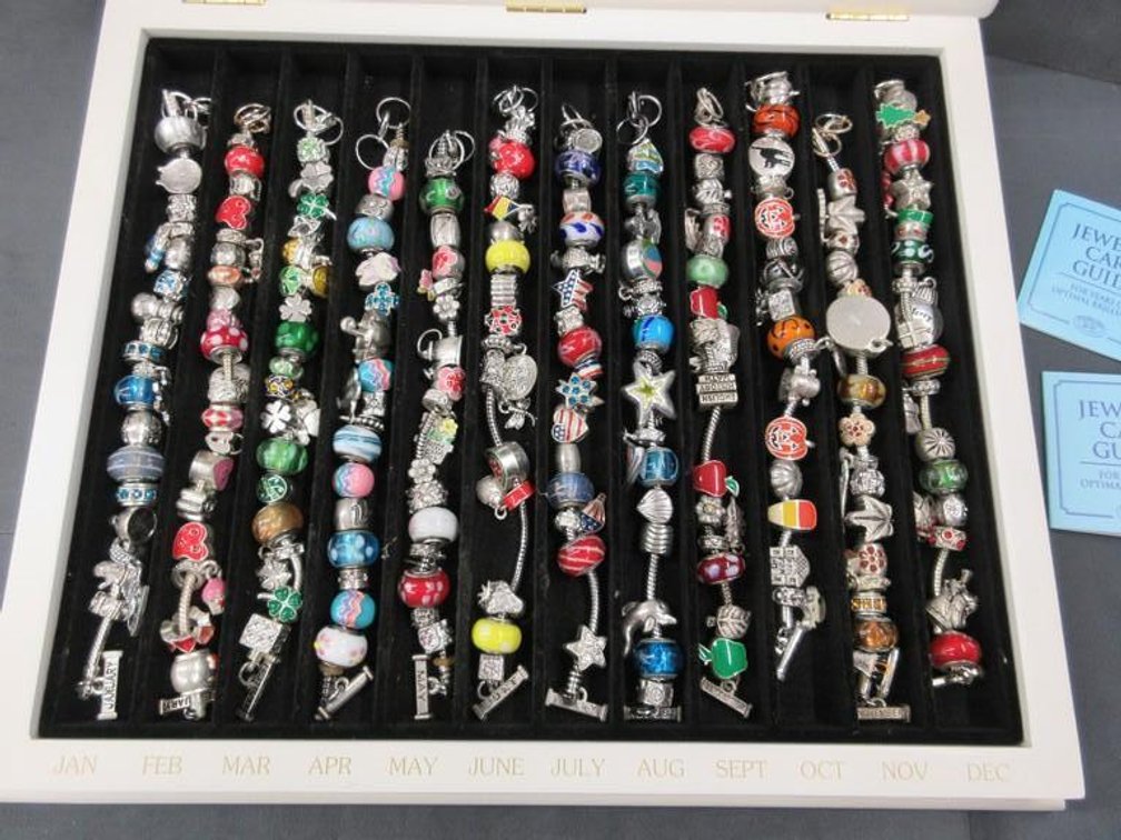 Set of 12 January - December charm bracelets in box