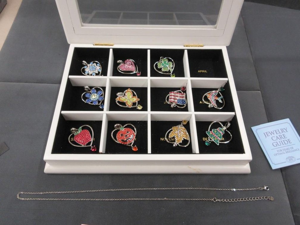 Set of 12 January - December fashion pendants in box