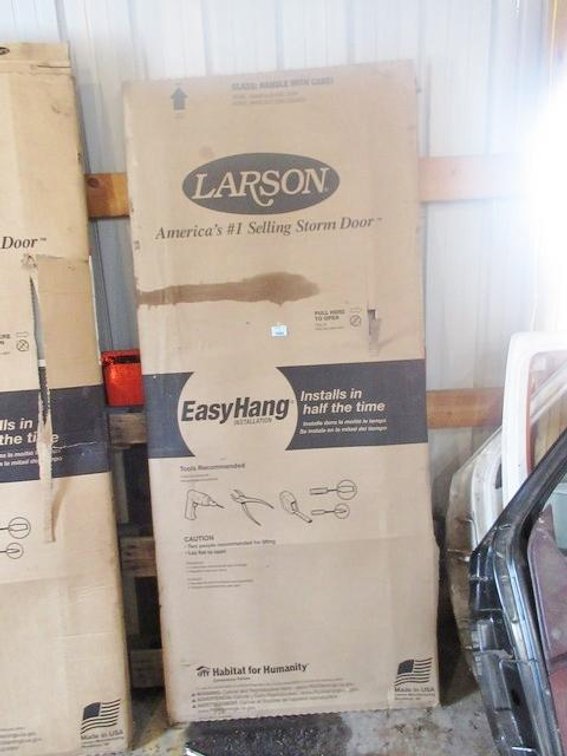 New Larson white metal screen door
