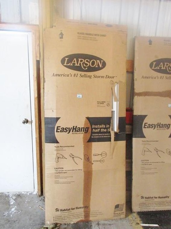 New Larson white metal screen door
