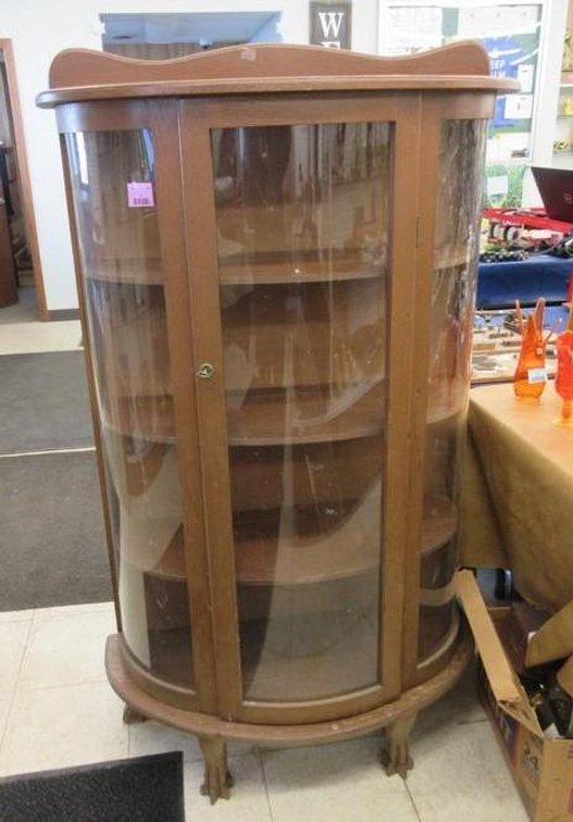 Oak curved front curio cabinet