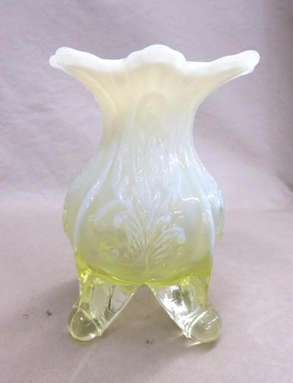 Yellow opalescent 4 footed vase