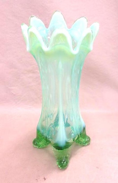 Green opalescent 4 footed vase