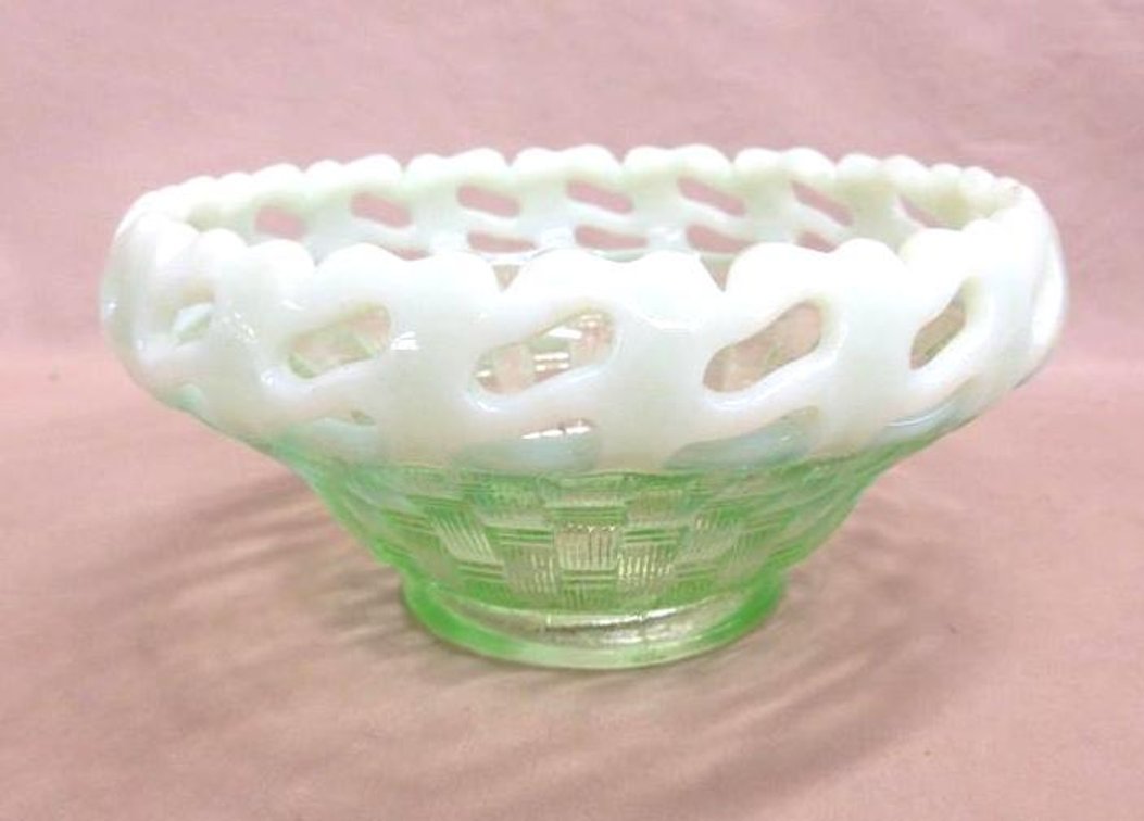 Green opalescent glass dish with lace edges