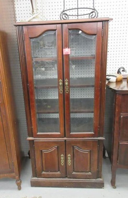 Pressed wood entertainment cabinet with glass door inserts