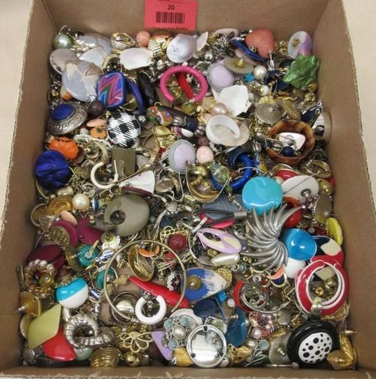 Flat of costume jewelry