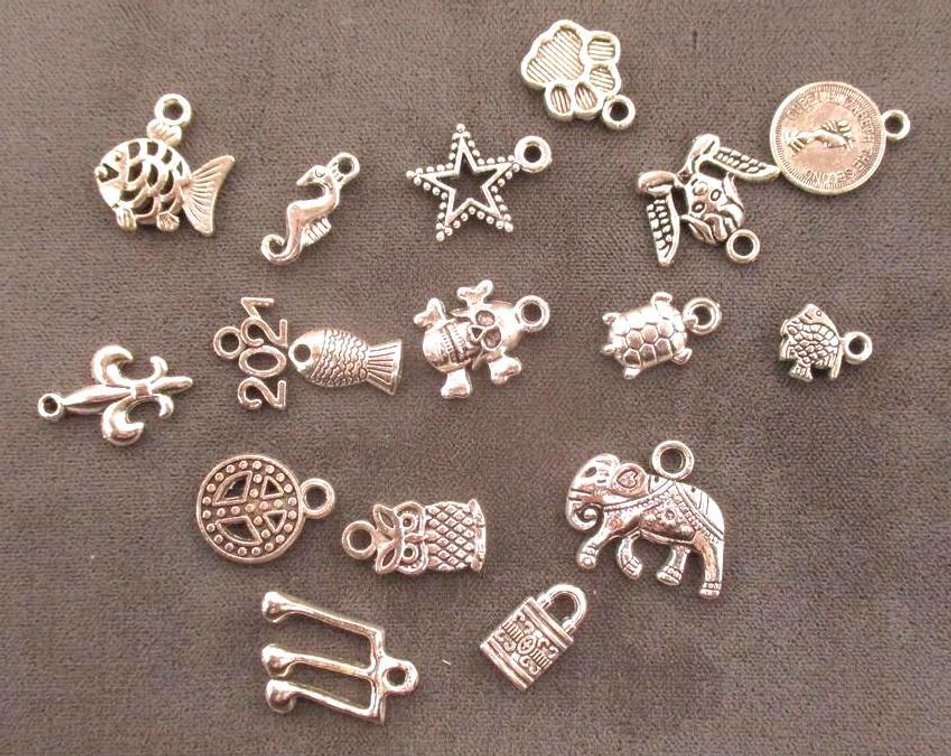 (15) Silver tone charms