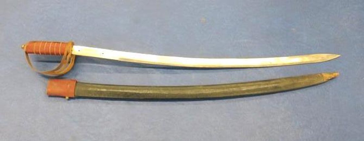 Ivacro etched sabre in scabbard