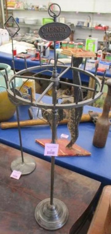 Antique steel "Cheney Cravat" tie display rack