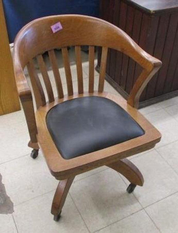 Antique oak rolling office chair