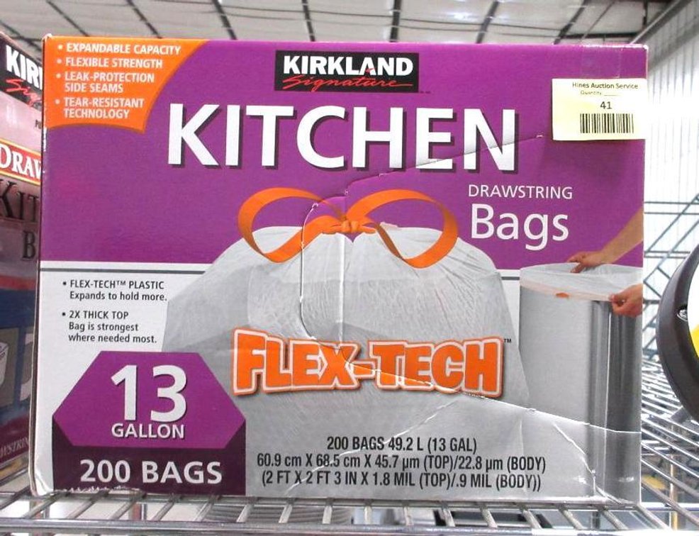 Box of Kirkland 13-gallon kitchen draw string bags