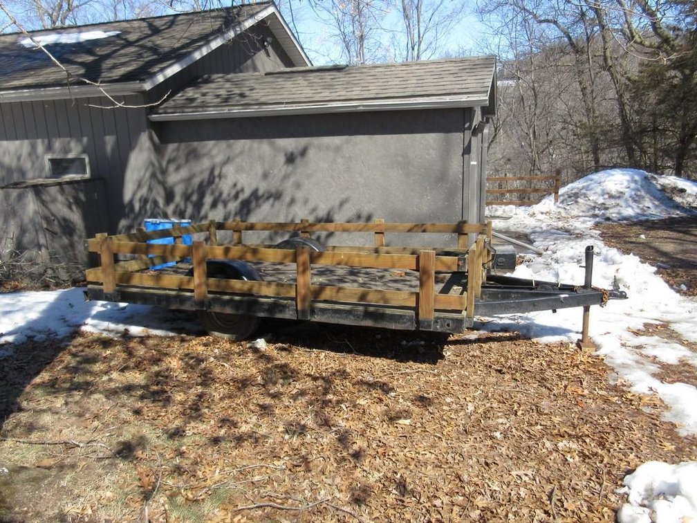 Utility trailer with wood sides