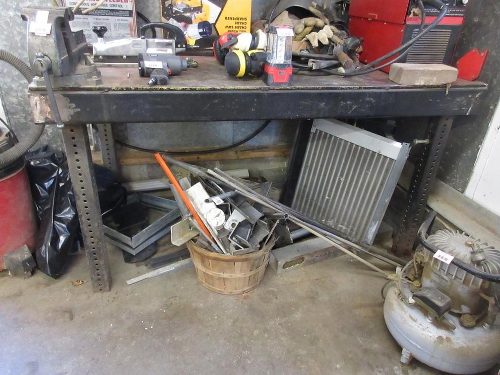 Heavy duty steel work table with vise (no loading or removal assistance)
